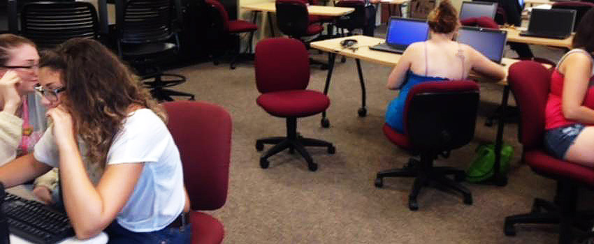 Students sitting in classroom.