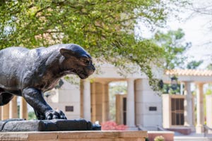 Jaguar statue in front of Moulton Tower.
