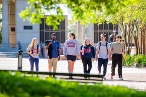 Alumni Plaza with students walking.