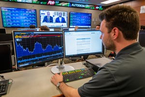 Student working on computer in MCOB lab.