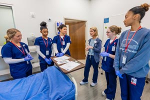 Nursing students in simulation lab.