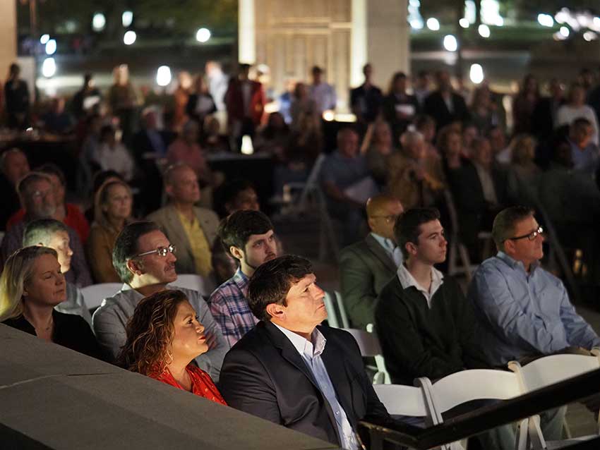 Audience looking at speaker.