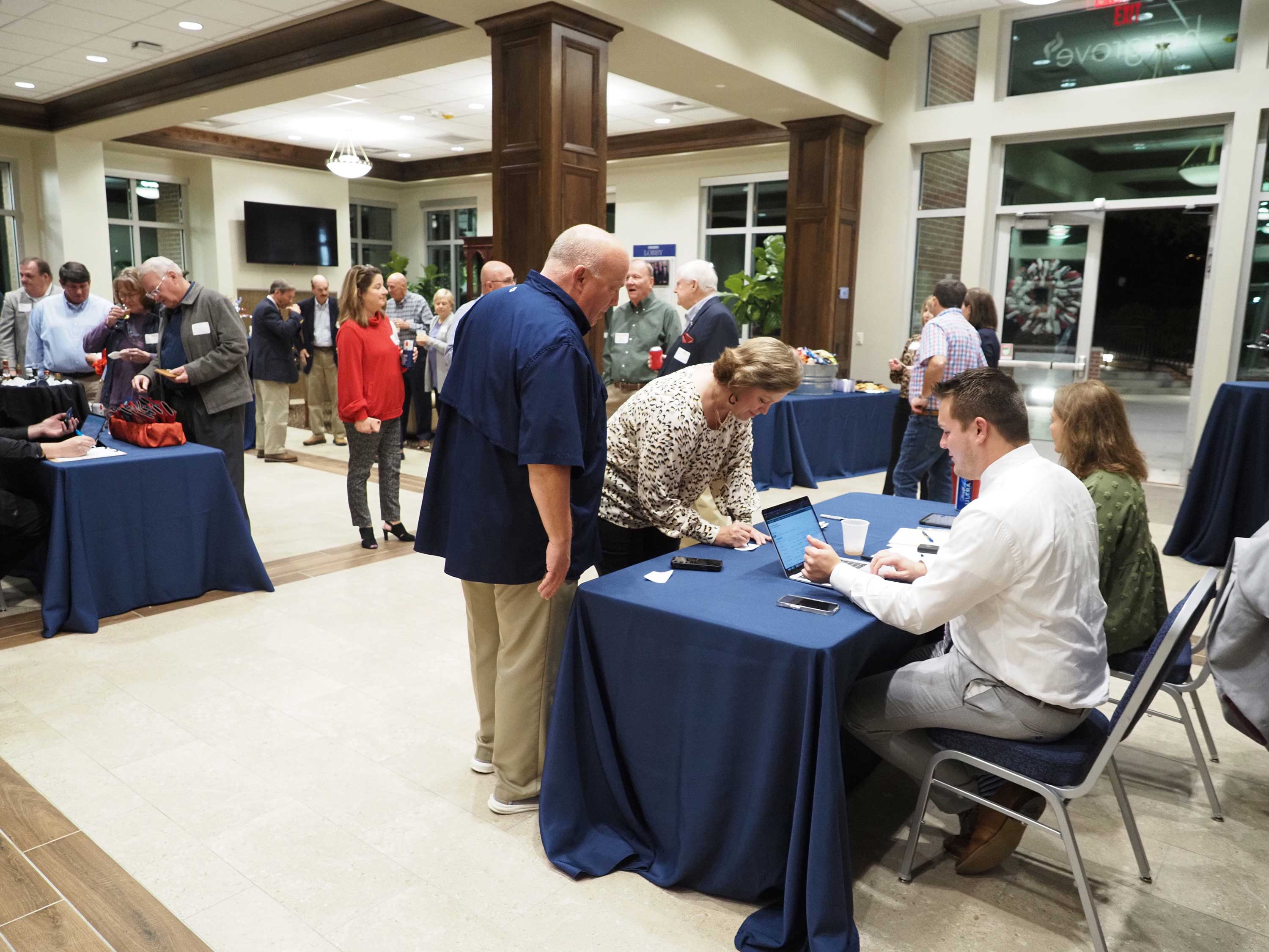 Table check in in Alumni Center.