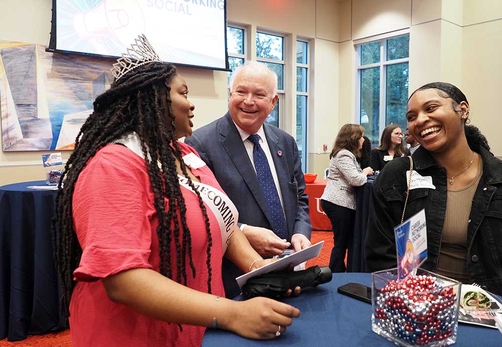 President Bonner talking to homecoming queen.