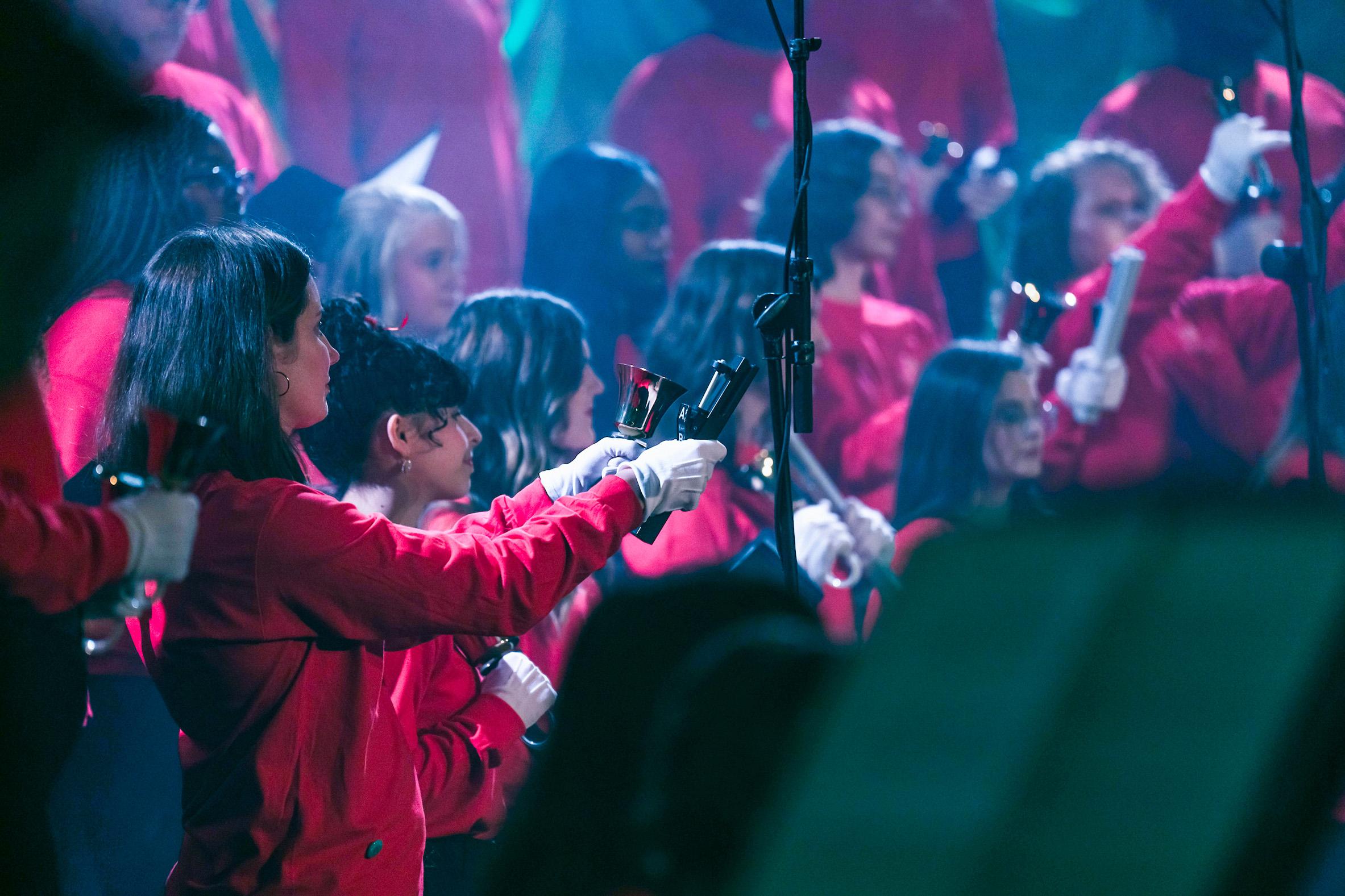 Hand bells playing at concert.