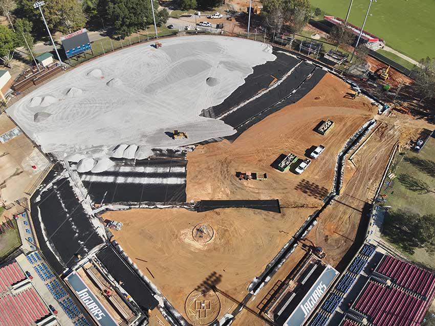 Construction site of Stanky Field showing concreate being poured.