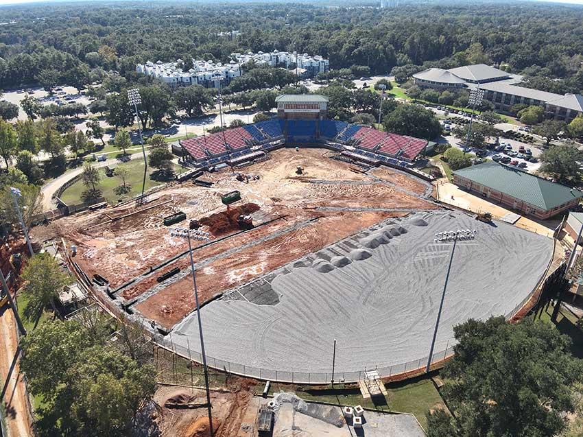 Construction site of Stanky Field showing concreate being poured.