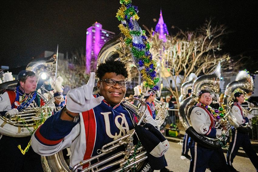 Jaguar Marching Band smiling with their J's up