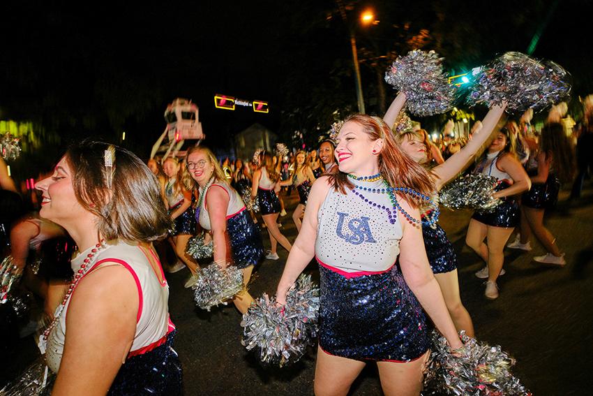 South Alabama Cheer with beads from Mardi Gras Celebration