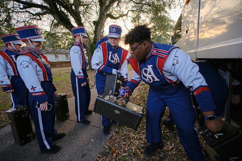 Jaguar Marding Band with their instrument case 