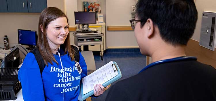 Childhood cancer survivor turned social worker, Katelyn Tillman helps patients at Children's & Women's Hospital