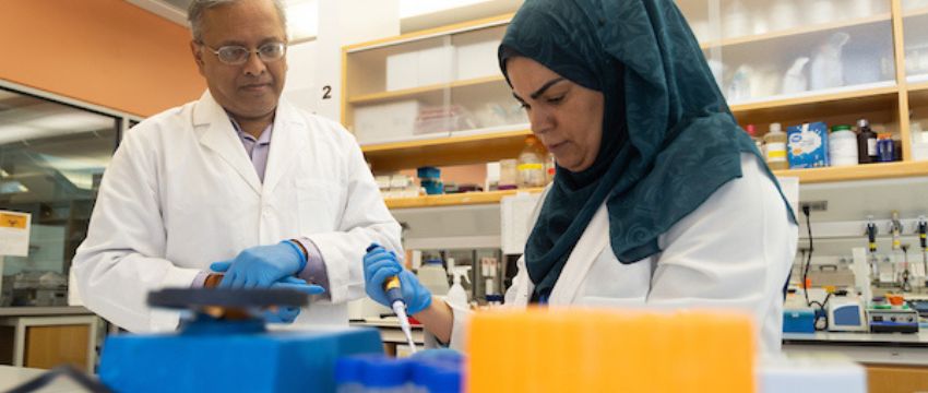 Photo of Dr. Dasgupta and Student in the Lab