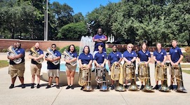 Pictured from a previous semester are members of the USA Tuba-Euphonium Ensemble standing outside of Laidlaw.