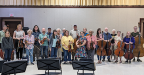 Pictured at a Laidlaw rehearsal are members of the USA String Orchestra.