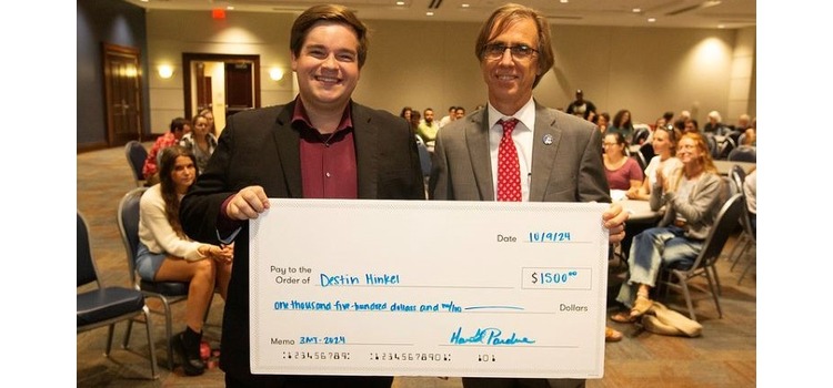 SoC student Destin Hinkel places second in the Three Minute Thesis competition.