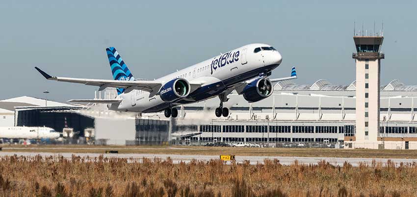 Jetblue plane taking off from the runway.