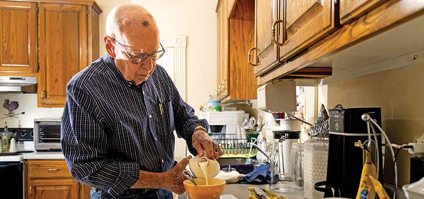 Harry Lancaster working in the kitchen.