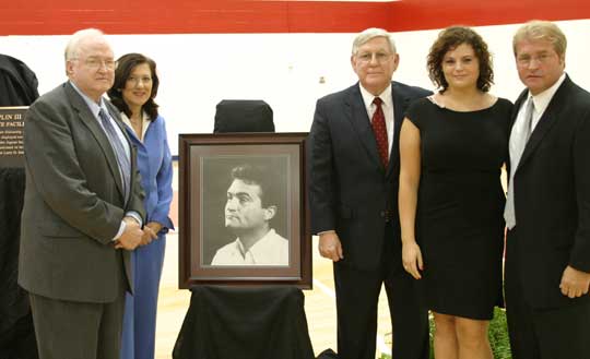 Standing from left are Larry Striplin Jr. and wife, Rhonda; President Gordon Moulton; Lauren Striplin, daughter of Larry Striplin III; and brother, David Striplin.