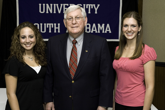 New York's Junior Miss Brynn Armstrong, USA President Gordon Moulton, and Wisconsin's Junior Miss Kaila Mattson