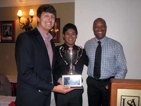 USA Greek Awards Celebration-University of South Alabama Dean of Students Dr. Michael Mitchell, far right, congratulates 2012 Dean’s Cup winners Danny Nguyen, center, interfraternity council president and Sigma Chi President Alex Wiles. The awards event was held in the John Counts Room. Photo Courtesy of Rachael Bolden, assistant director of the USA Student Center.