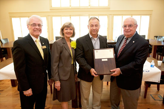 Dr. Donald Epley, USA Center for Real Estate Studies; Sue Winters, Mobile Area Association of Realtors; Joe Rogers, Mobile Area Association of Realtors; Dean Carl Moore, Mitchell College of Business