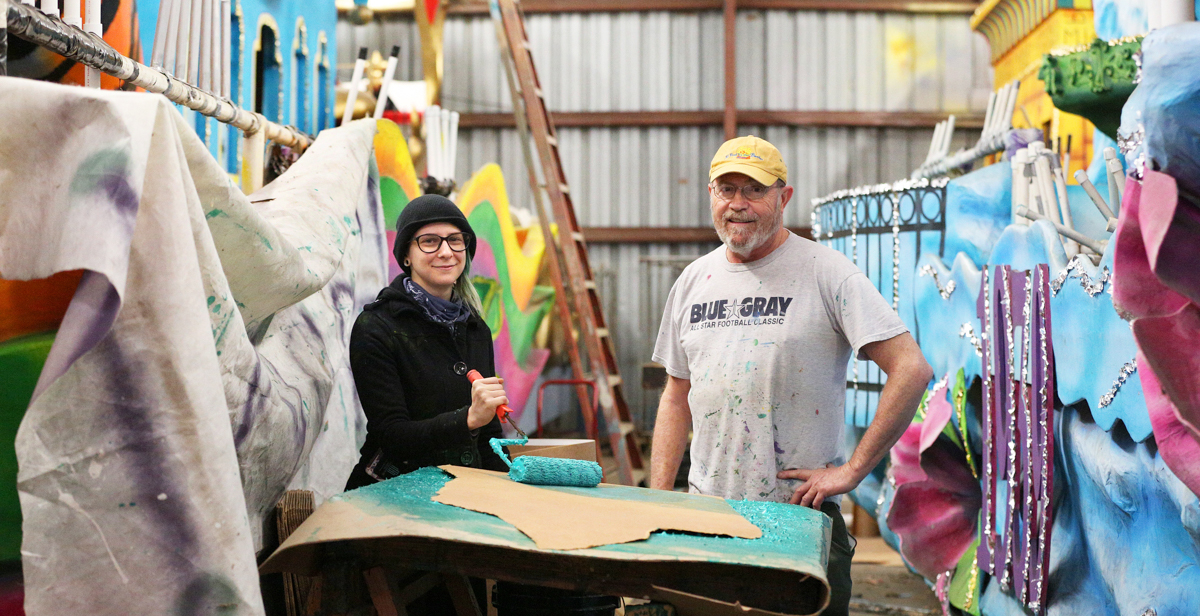 Vanessa Quintana is one of the latest South graduates to work under Steve Mussell, right, designing and building Carnival floats. “Steve tells me to put on my Mardi Gras goggles. He wants me to look at a float like someone would at a parade.”