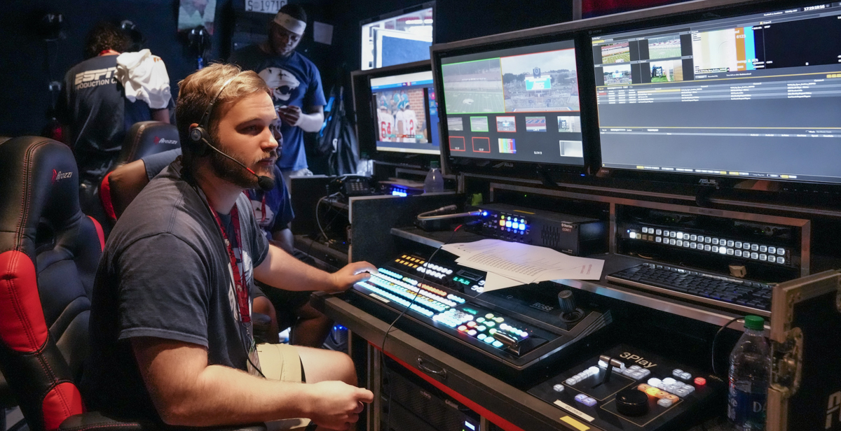 Chris Hites, a junior majoring in communications, works as a replay operator with other members of the student ESPN+ broadcast team in the control booth during Saturday's game against the University of Louisiana at Lafayette.