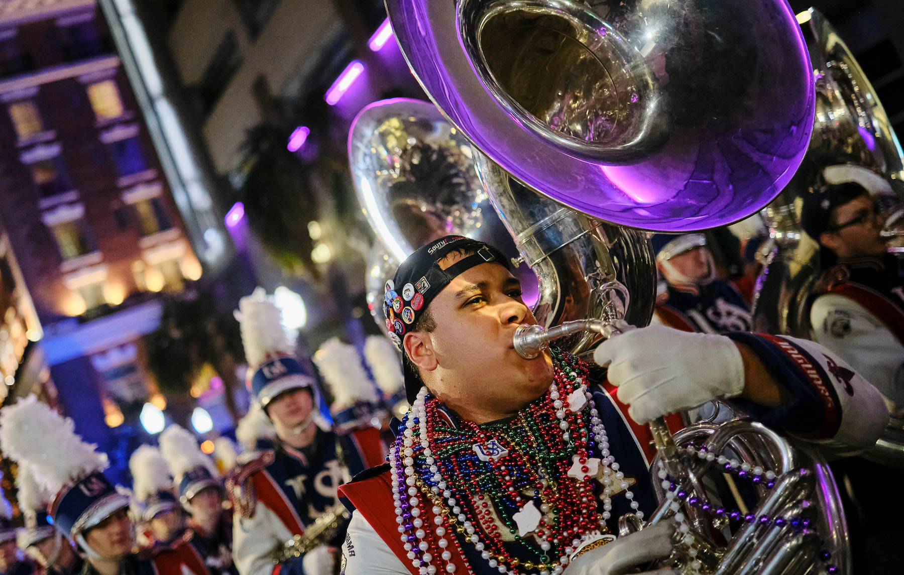 The Jaguar Marching Band marching with the Conde Cavaliers in downtown Mobile on Friday, Feb. 14, 2025.