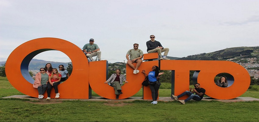 Summer 2023 USA Global Healthcare in Ecuador and the Galapagos group in front of the Quito monument